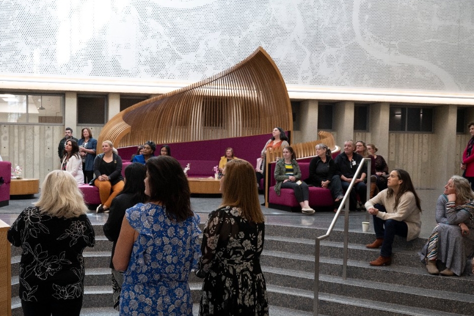 faculty and staff gathered in atrium